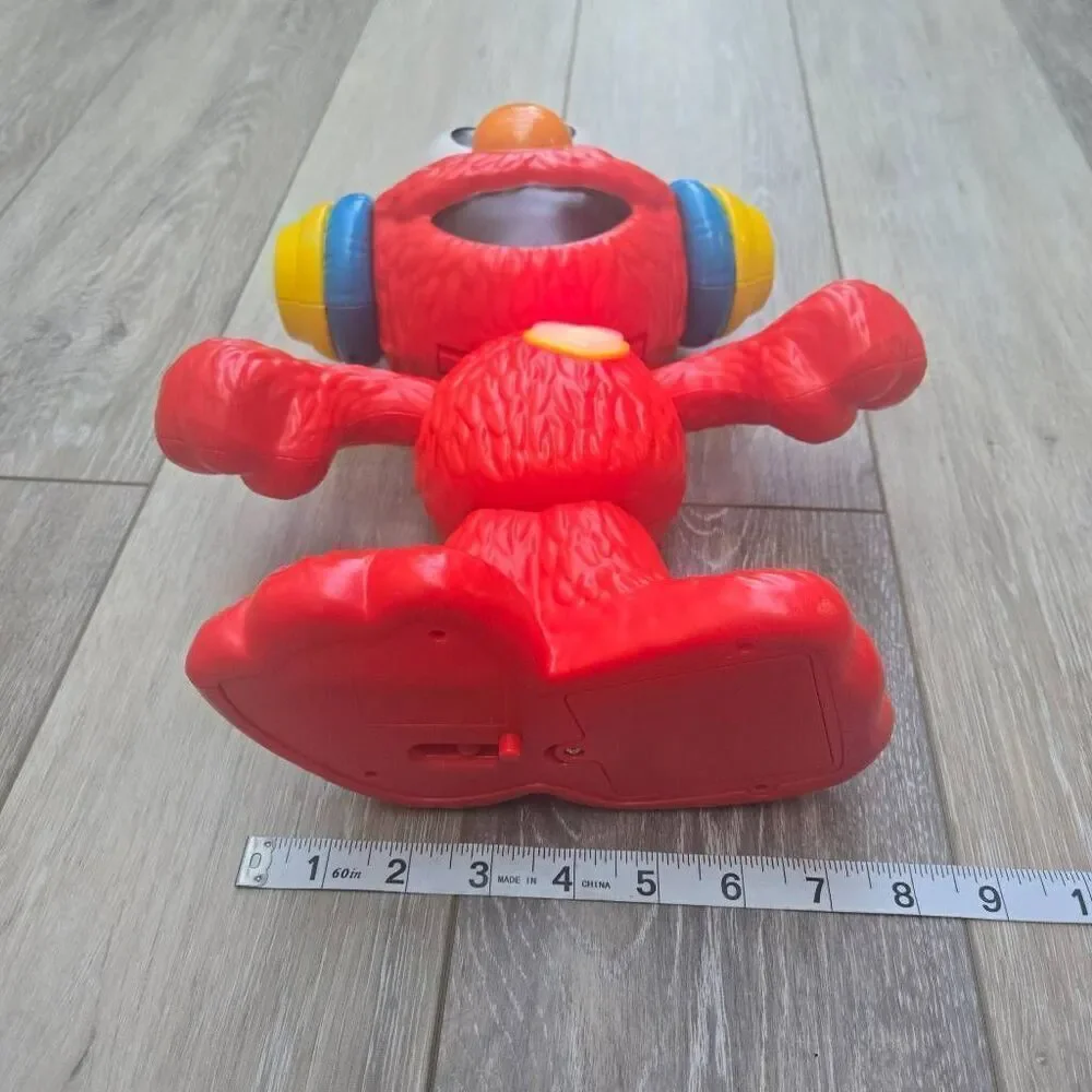 Sesame Street Let's Dance Elmo: 12-inch Elmo Toy Sings Sesame Street Toy for Kid